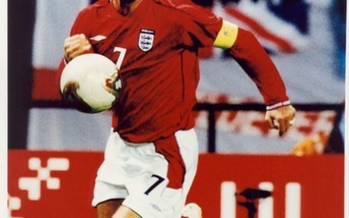 BECKHAM DAVID: (1975- ) English Footballer. Signed colour 8 x 12 photograph of Beckham in a full...