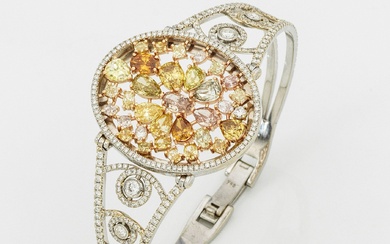 Bracelet diamant Fancy glamour en or blanc ajouré, taille 750. Diamants Fancy naturels dans les...