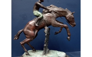 Bronze model of a horse and jockey mounted on marble base {H...
