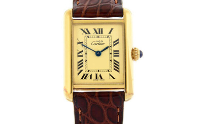 CARTIER - a gold plated silver Must De Cartier Tank wrist watch, 22x22mm.