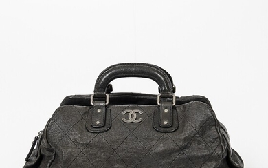 SOLD. Chanel: A bag made of black caviar leather with silver toned hardware, two short...