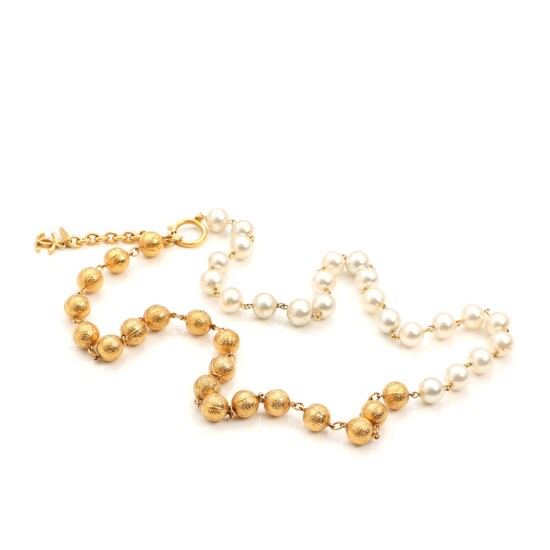 SOLD. Chanel: A faux pearl and gold doublé necklace with CC-logo by clasp. L. 82-90...