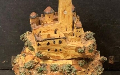 Covered pot showing a castle on a glazed earthen mound. High Provence. Early 20th century.