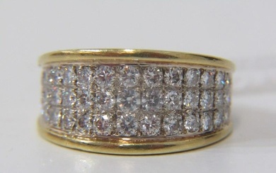 DIAMOND CLUSTER RING, a heavy 18ct yellow gold ring set with...