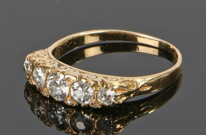 Diamond set ring, with a row of five diamonds to the