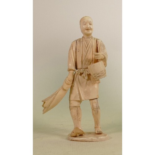 Early 20th century Japanese ivory sectional figure: Of man w...
