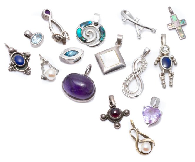 FIFTEEN SILVER STONE SET PENDANTS; assorted shapes and sizes set with amethyst, cultured pearls, paua shell, mother of pearl, blue t...