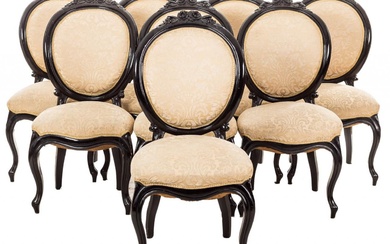 Fauteuil élisabéthain en acajou composé d'un canapé, d'une paire de fauteuils et de huit chaises....