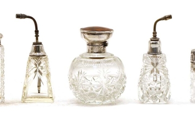 Five cut glass silver collared perfume bottles