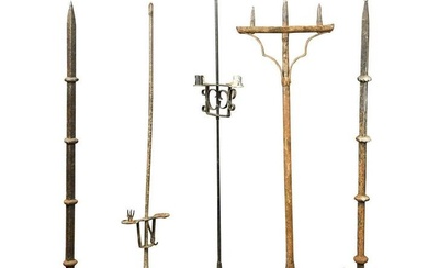 Five wrought iron candle stands
