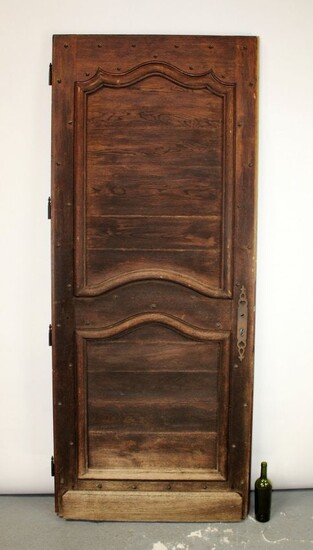 French oak raised panel and studded door