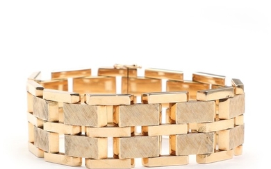 Gifa: A wide 14k gold bracelet. L. 18.8. W. 2.2 cm. Weight app. 42 g.
