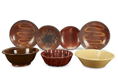 Group of six slip-decorated redware and redware items