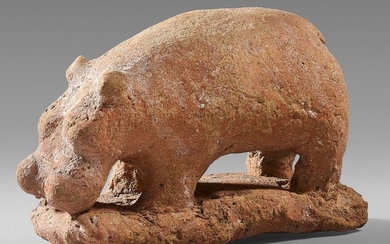 Hippopotamus figurine. The massive body, short on legs,...