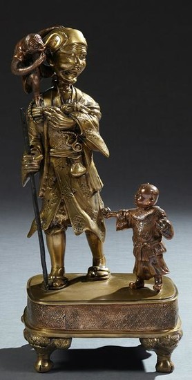 Japanese Bronze Figural Group, early 20th c., of a man