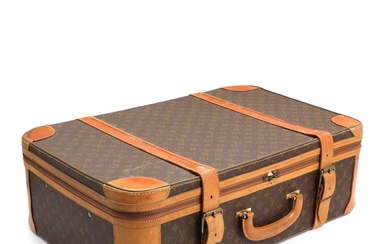 Louis Vuitton A suitcase of monogram canvas with patinated full-grain leather trim,...