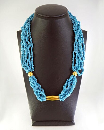 Necklace of strands of turquoise and 18K gold beads