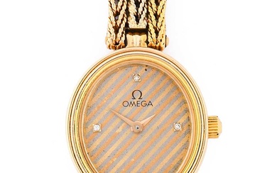 Omega: A Lady's 18 Carat Gold Wristwatch, signed Omega, ref:...