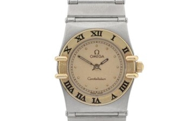 Omega. A lady's stainless steel and gold quartz bracelet watch, Constellation, c. 1990 champagne dial with applied gold hour dots, outer printed five minute divisions, luminous filled hands, brushed and polished steel case with fixed gold Roman...