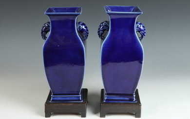 PAIR CHINESE COBALT-GLAZED PORCELAIN VASES WITH TEAKWOOD STANDS. Squared baluster...