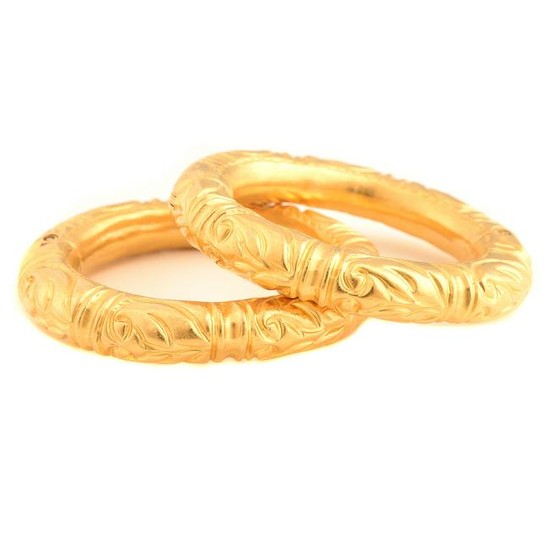 Pair of Matching 24k Yellow Gold Bracelets.