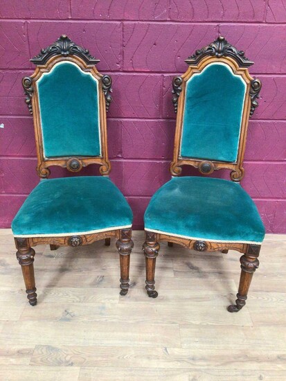 Pair of Victorian carved oak and walnut high back side chairs