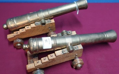 Pair of quality bronze cannon models with 11 inch...