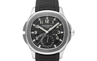 Patek Philippe Reference 5164A-001 Aquanaut Travel Time | A stainless steel dual time zone wristwatch with date and day/night indication, Circa 2012