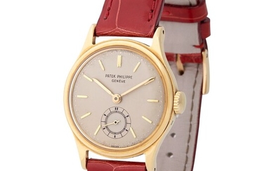 Patek Philippe. Very Elegant and Fine Calatrava-Style Wristwatch in Yellow Gold, Reference 2451, With Subsidiary Seconds and Extract from Archives