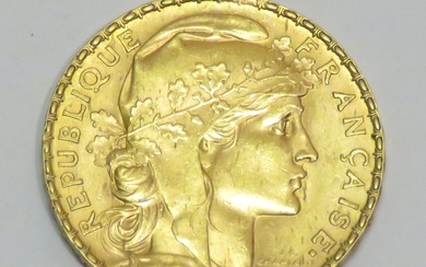 Pièce en or de 20 Francs "Coq" datée de 1910. Poids : 6g45. Diam :...