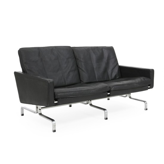 Poul Kjærholm: “PK-31/2”. Two seater sofa with steel frame. Sides and cushions in seat and back upholstered with black leather. L. 138 cm.