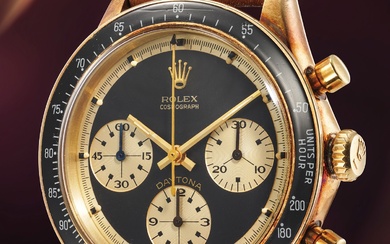 Rolex, Ref. 6241 A very rare and attractive 14K yellow gold chronograph wristwatch with black "Paul Newman" dial and bracelet
