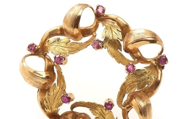 SOLD. Ruby brooch set with numerous faceted rubies, mounted in 18k gold. L. 3.8 cm. Weight app. 7.5 g. – Bruun Rasmussen Auctioneers of Fine Art