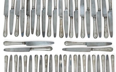 Twenty-four silver-handled Hanoverian pattern table knives, London, 1927, J. Parkes & Co., together with 23 matching dessert knives, handles same date and maker, all knives engraved with initial 'M' to terminals (a lot)