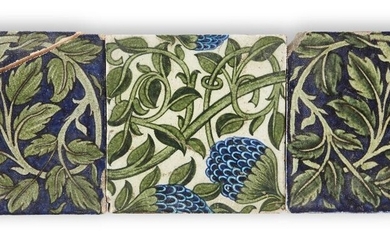 William de Morgan (1836-1917), Three tiles: two with green foliage on deep blue ground, circa 1890, and one with berries and foliage on cream ground, 1888-1897, Glazed earthenware, Berries and foliage with impressed tulips mark verso for the early...