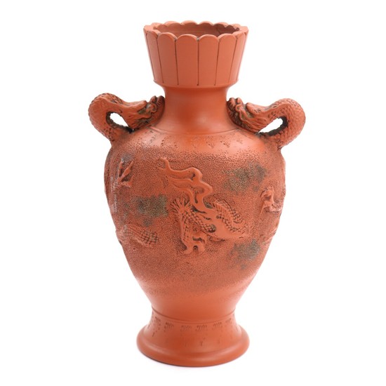 Yixing pottery vase, modellede with dragons and flames in light relief. 20th century. H. 19 cm.