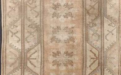 a modern caucasian style turkish rug with pale ground, 316 x 122cm