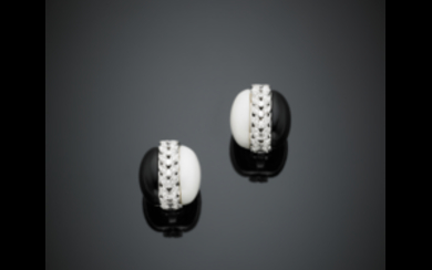*White gold onyx and white agate clip earrings accented...