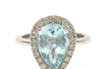 An aquamarine and diamond ring set with a pear shaped aquamarine encircled by numerous brilliant-cut diamonds, mounted in 18k white gold. Size 55.