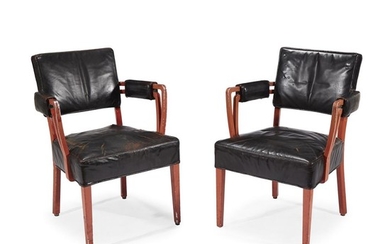 A pair of American modern armchairs purportedly from the...