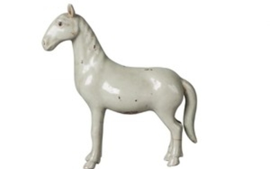 A Chinese porcelain celadon glazed horse, Qing...