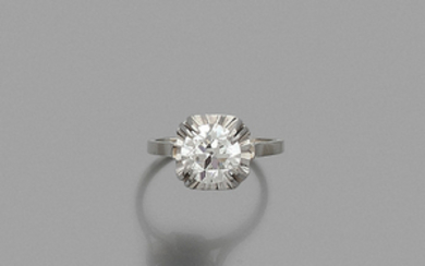 DIAMOND RING A diamond, platinum and gold ring. Weight :...
