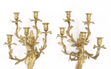A pair of five-light gilt-bronze bracket lamps. Rococo style, early 20th century. H. 52 cm. W. 31 cm.