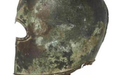 A Greek bronze Corinthian partial helmet, Archaic...