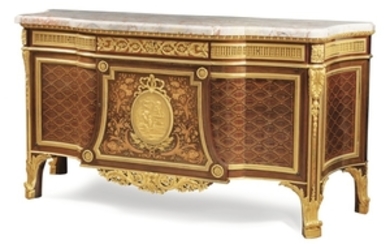 Henry Dasson (1825-1896) A French gilt-bronze mounted amaranth, sycamore, mahogany, pearwood marquetry and parquetry commode, after the model by Jean-Henri Riesener