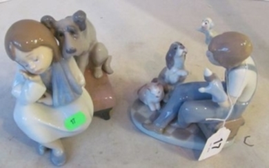A Lladro girl with dog and boy with dog, cat and puppets