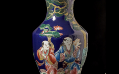 A polychrome-enamelled baluster vase decorated with figures, with apocryphal Qianlong mark China, 20th century (h. 55 cm.)