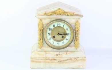 A Travertine Mantle Clock