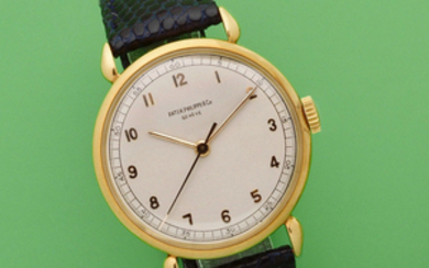 Patek Philippe. An 18K gold manual wind wristwatch