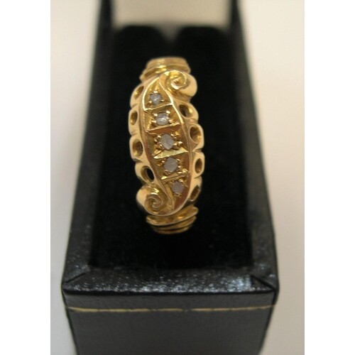 18ct yellow gold, boat shaped ring with 5 square cut diamond...